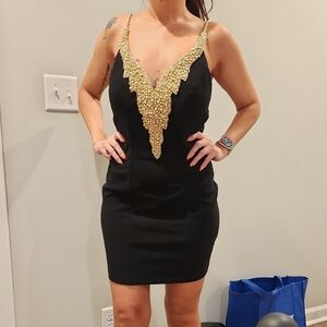 Elegant Black Dress with Gold Bead Detailing